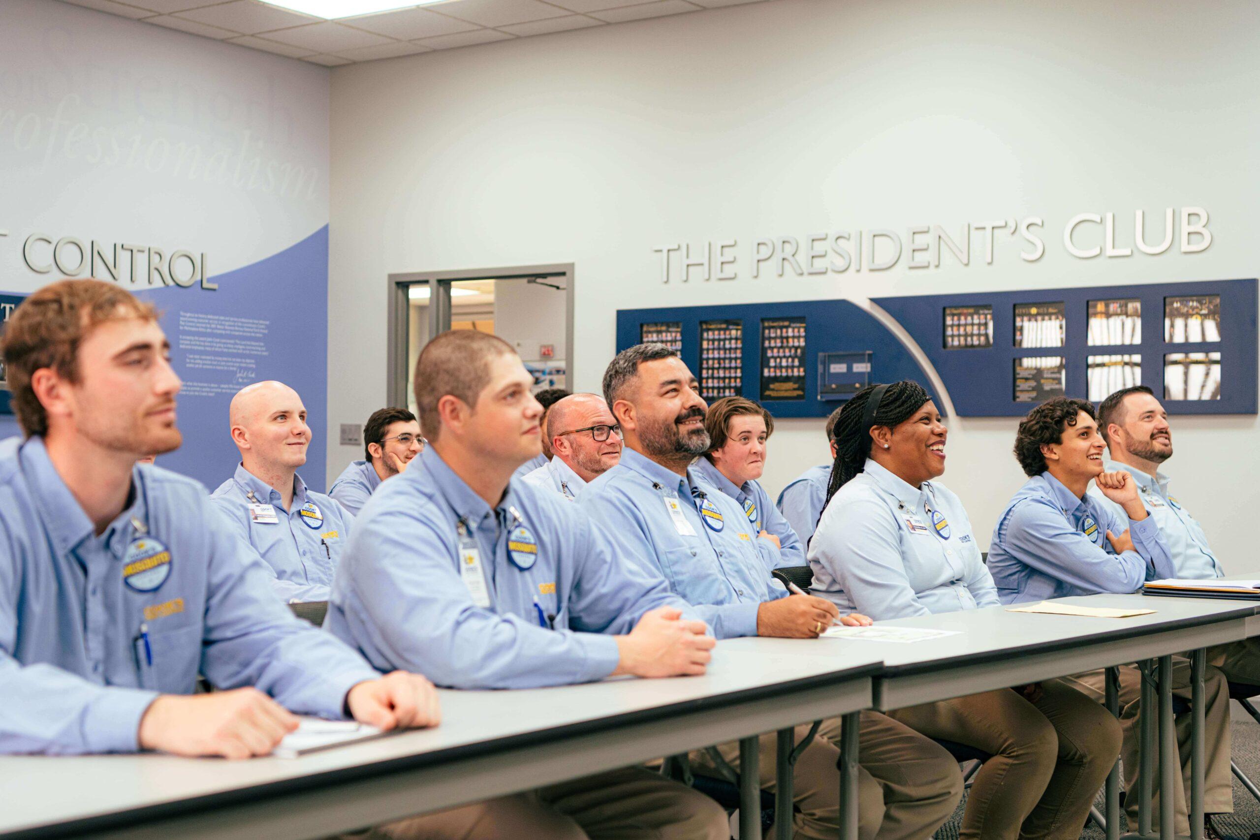 employees sitting together for in person training